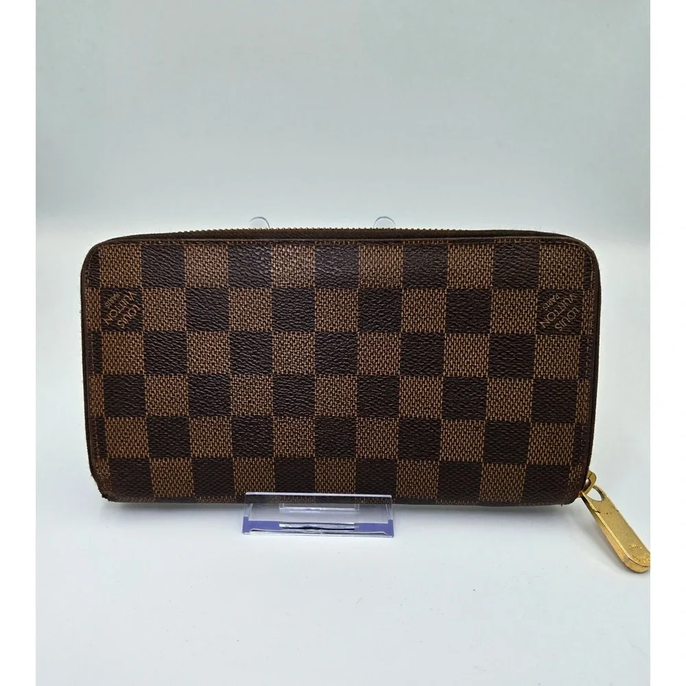 Louis Vuitton Damier Ebene Zippy Wallet Brown Coated Canvas